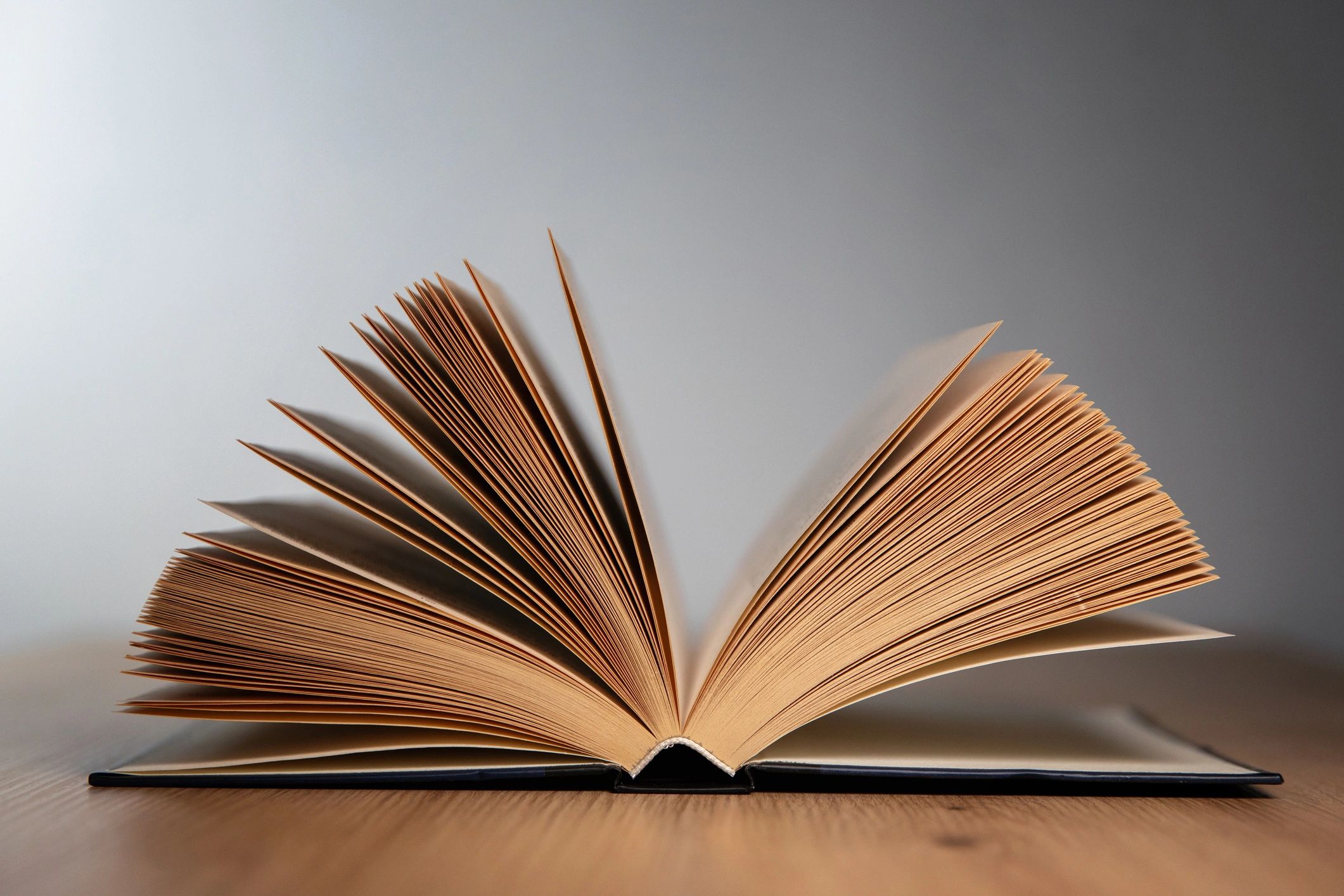 Open book on a wooden table